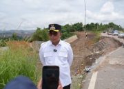 Jalan Poros Sangatta-Bengalon Longsor Lagi, Pemkab Kutim Desak PT KPC Bertanggung Jawab Atas Kerusakan Akibat Tambang